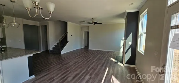 a view of entryway with wooden floor