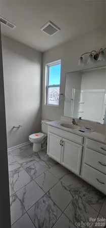 a bathroom with a sink and a toilet