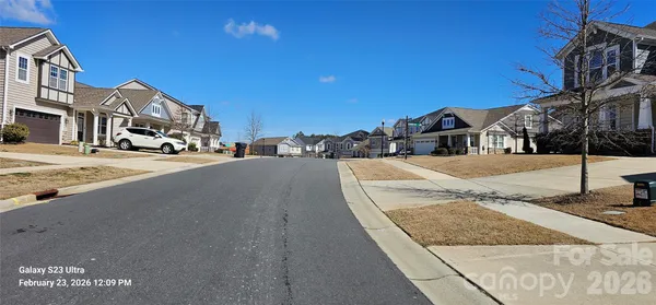 a view of a street with houses