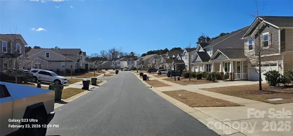 a view of a street with houses