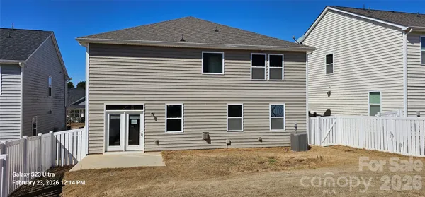 a front view of a house with a garage