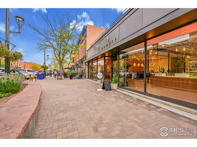 a view of a building with a street