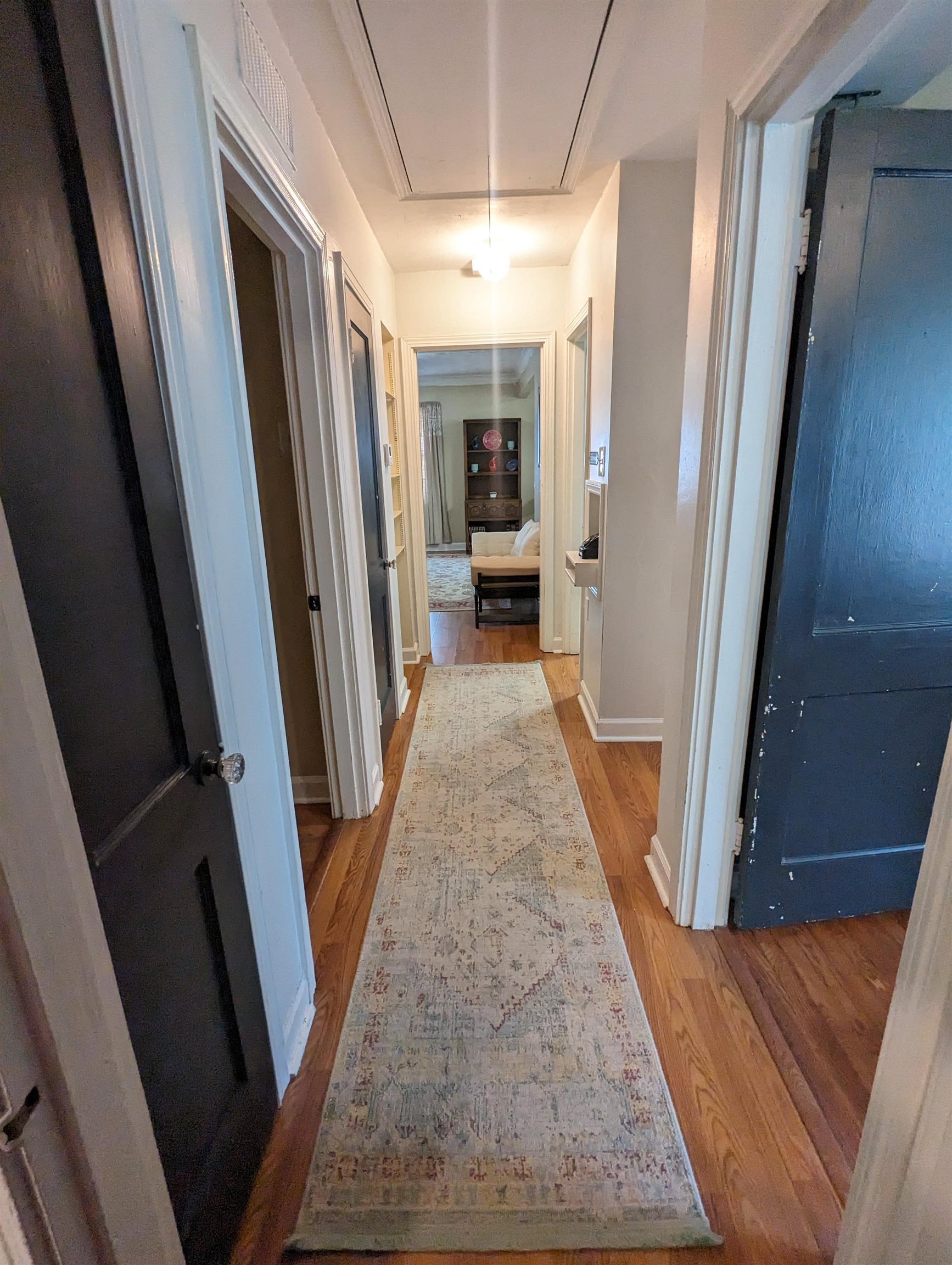 456 Gerald Road Memphis, TN 38122 - Photo 11 of 25 a view of a hallway with wooden floor and staircase