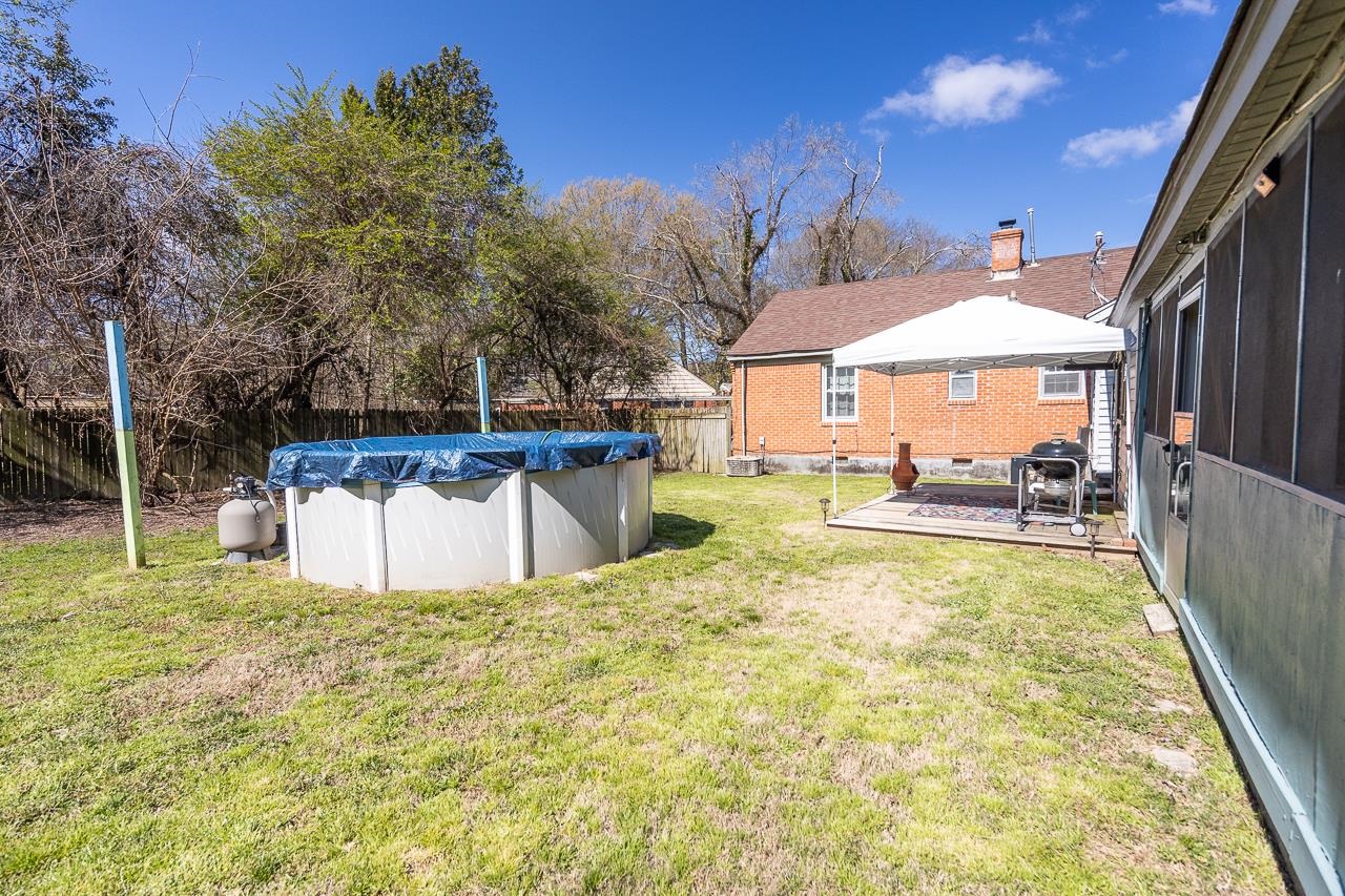 456 Gerald Road Memphis, TN 38122 - Photo 19 of 25 a view of a house with a yard