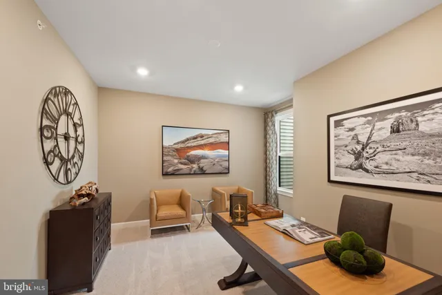 a workspace with furniture and window