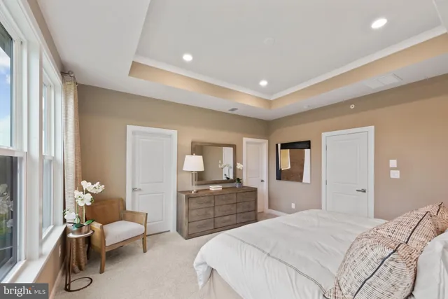 a bedroom with a bed and furniture