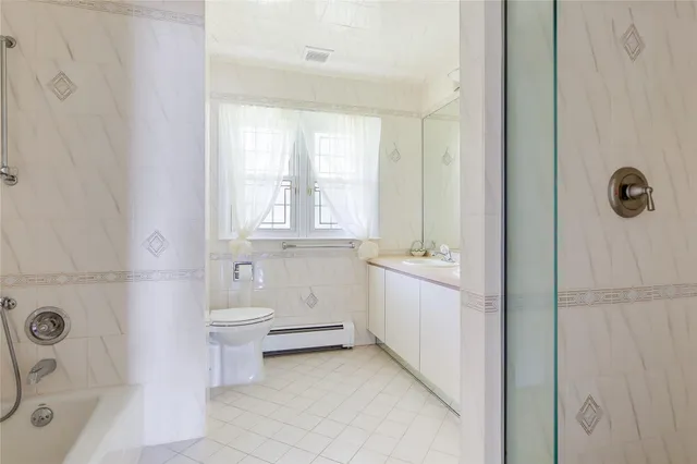 a view of a lake with a yard