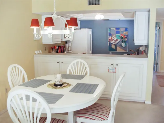 a view of a dining room with furniture