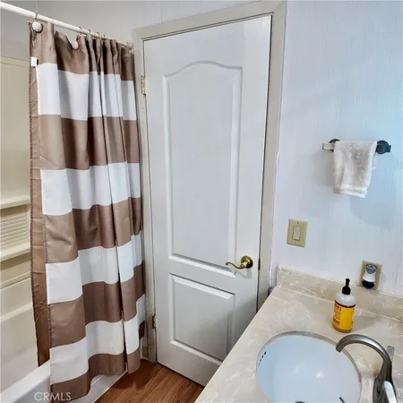 a bathroom with a sink and toilet