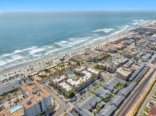 an aerial view of beach and ocean