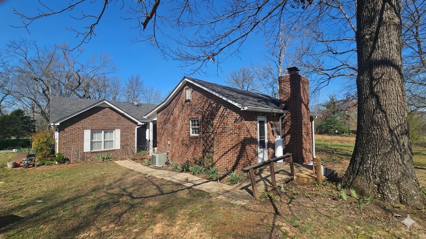 2769 New Hall Road Greenbrier, TN 37073 - Photo 28 of 58 a front view of a house with garden