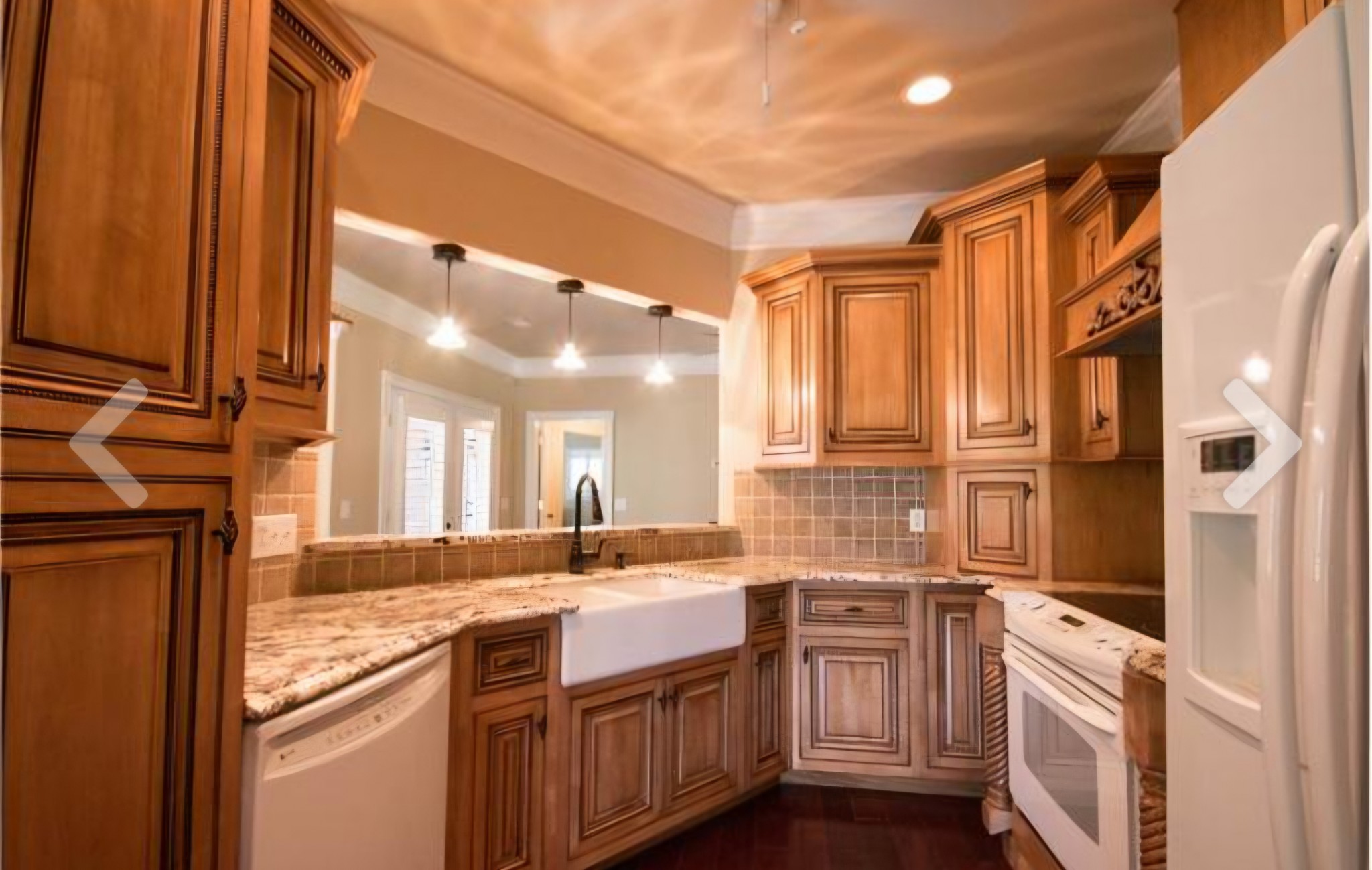 2769 New Hall Road Greenbrier, TN 37073 - Photo 6 of 58 a kitchen with stainless steel appliances granite countertop a sink a stove and a refrigerator