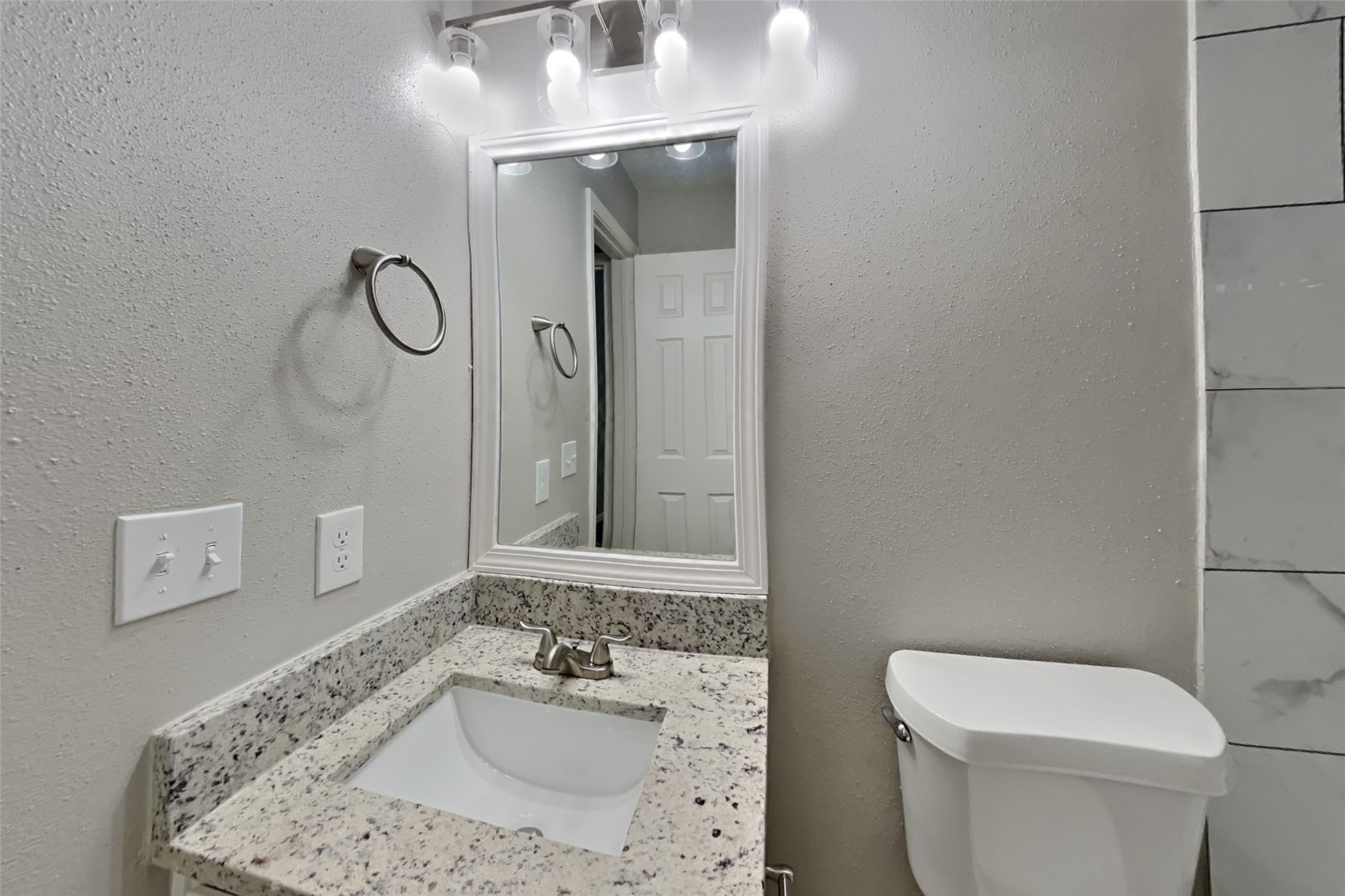2527 Anthony-Hay Lane Katy, TX 77449 - Photo 15 of 18 a bathroom with a sink a toilet and a mirror