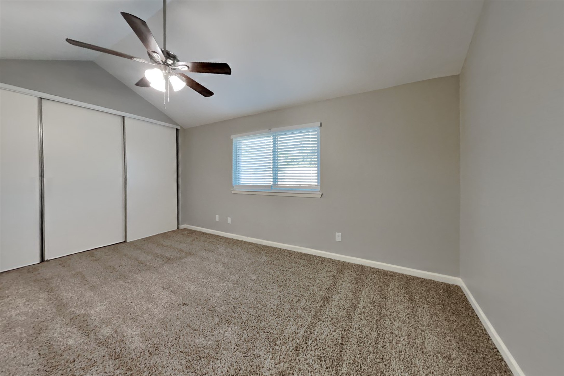 2527 Anthony-Hay Lane Katy, TX 77449 - Photo 8 of 18 a view of an empty room with a chandelier fan