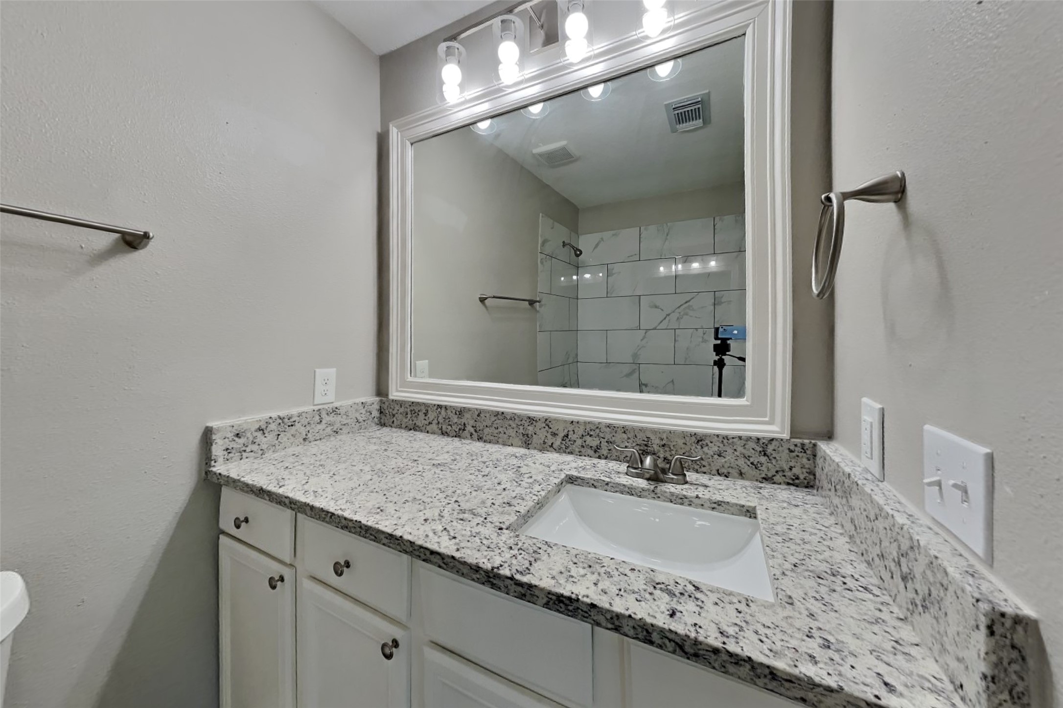 2527 Anthony-Hay Lane Katy, TX 77449 - Photo 9 of 18 a bathroom with a granite countertop sink and a mirror