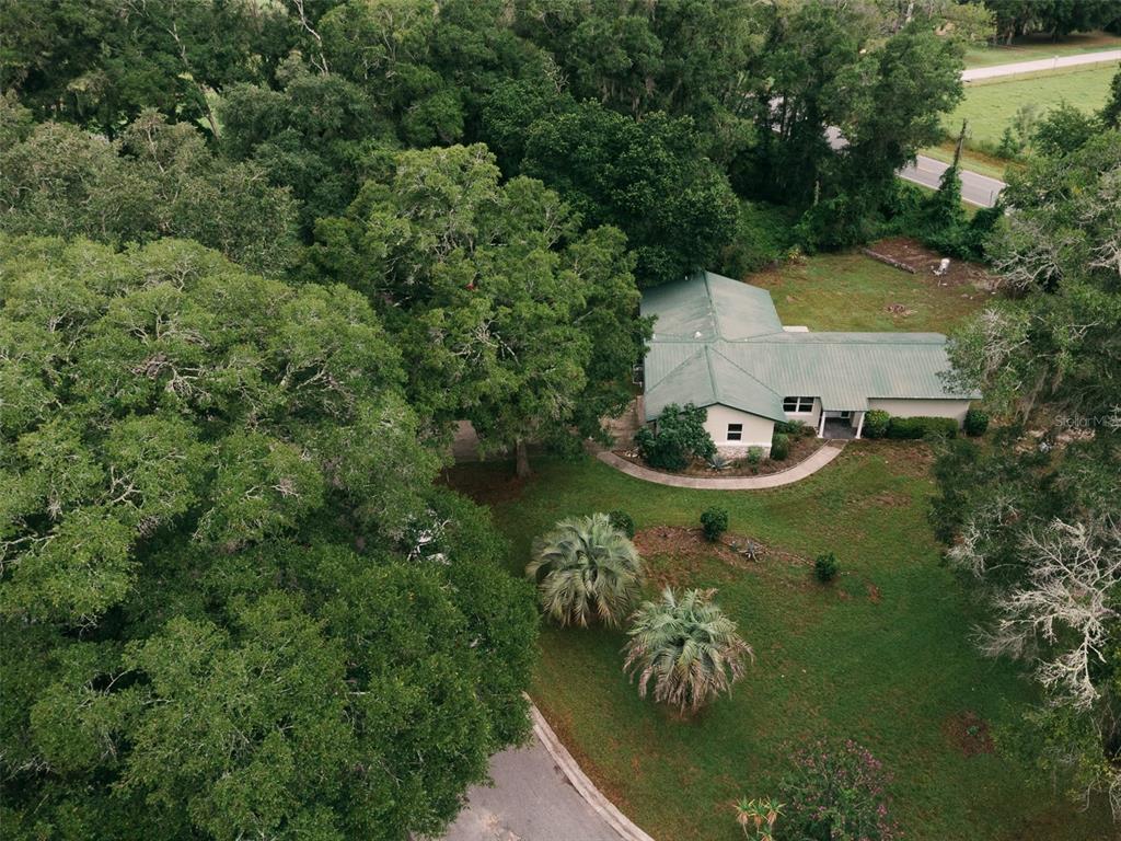 14522 Southeast 1st Av Road Summerfield, FL 34491 - Photo 1 of 30 an aerial view of a house with a yard