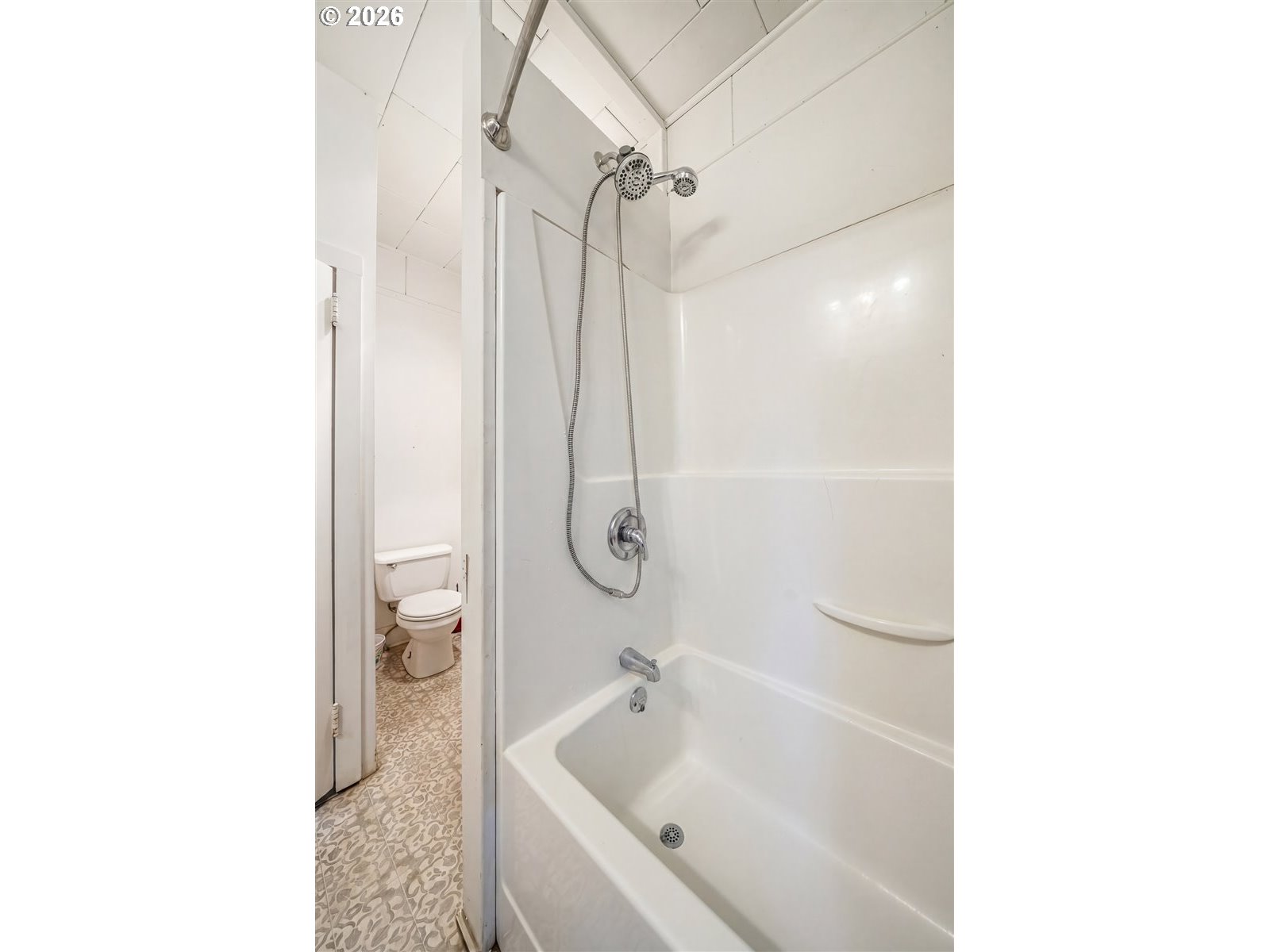 740 South 6th Street Cottage Grove, OR 97424 - Photo 19 of 21 a bathroom with a tub shower sink and vanity