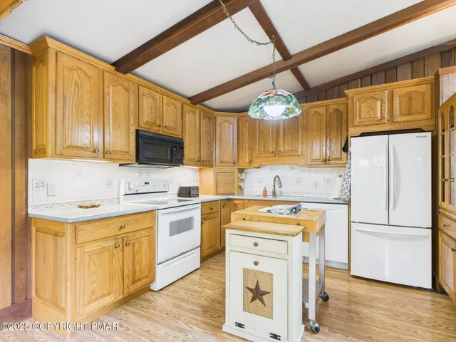 a dining room with furniture window wooden floor