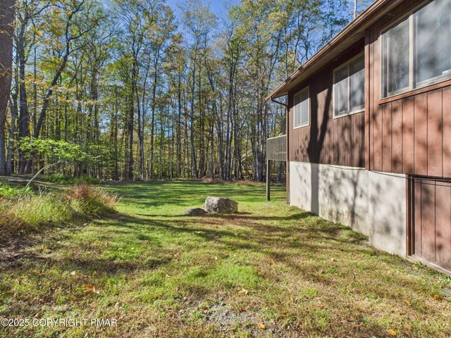 a house with trees in front of it