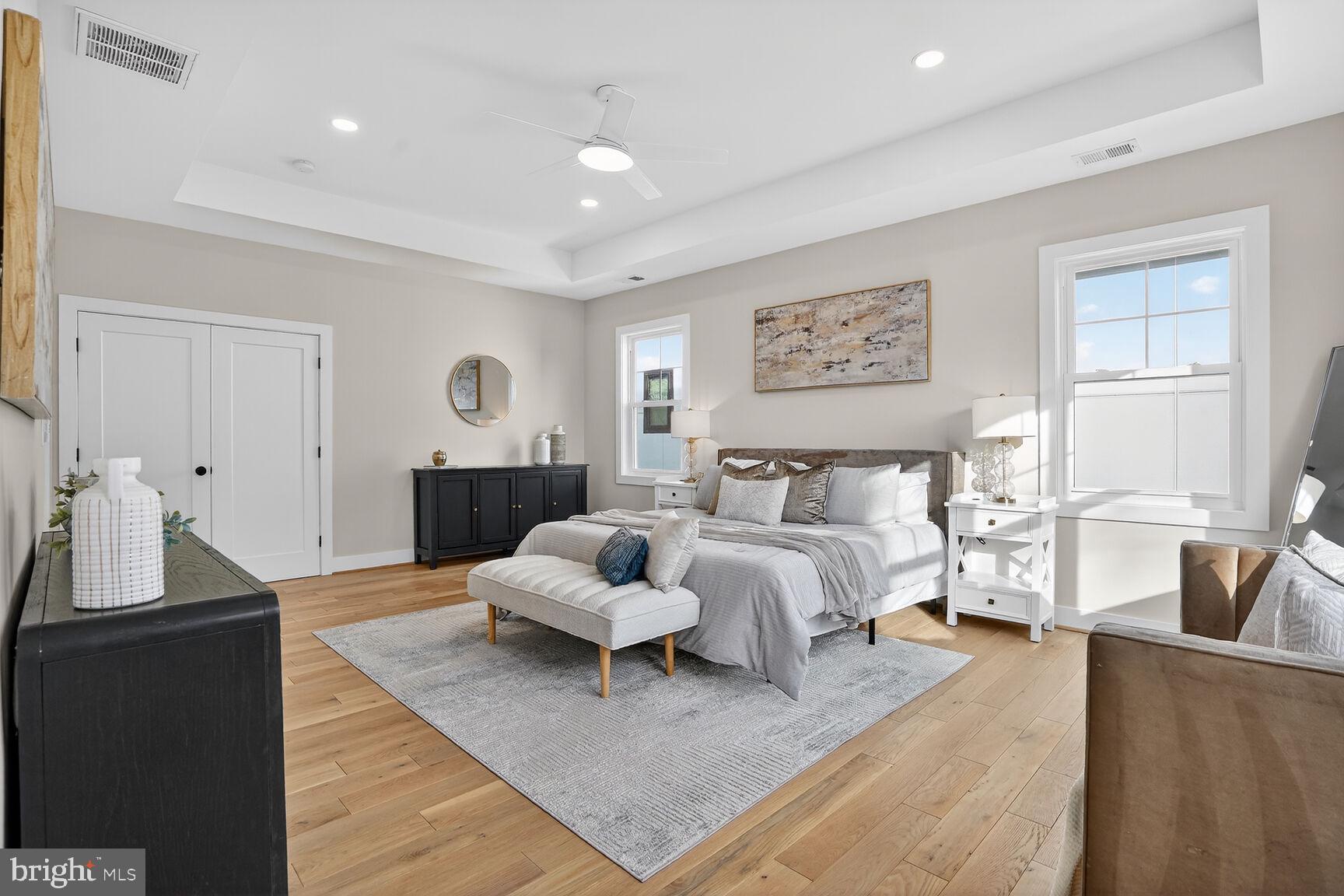 423 North Cleveland Street Arlington, VA 22201 - Photo 24 of 39 Primary bedroom w/ hardwoods, tray ceiling