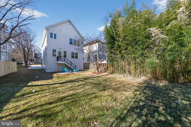 a view of a house with snow on the background