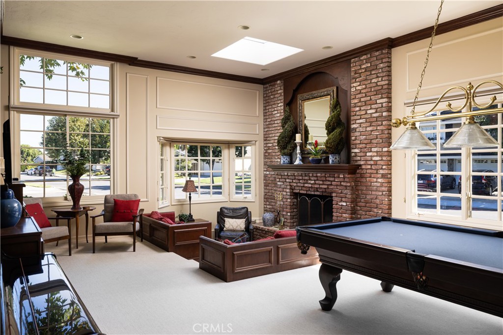 1901 Windward Lane Newport Beach, CA 92660 - Photo 12 of 52 a living room with furniture fireplace and window