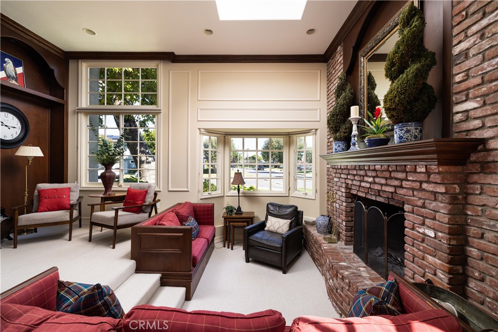 1901 Windward Lane Newport Beach, CA 92660 - Photo 14 of 52 a living room with furniture fireplace and window