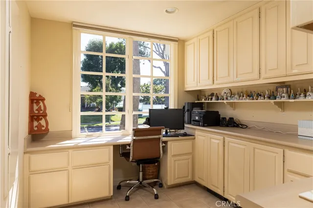 a bathroom with a toilet a sink and a mirror