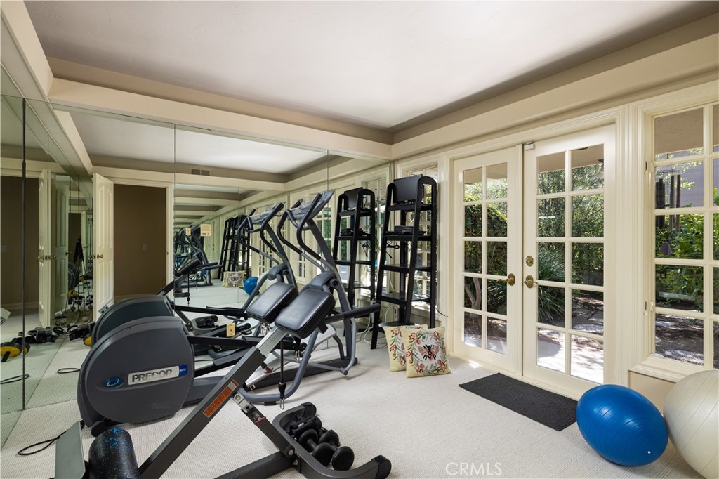 1901 Windward Lane Newport Beach, CA 92660 - Photo 19 of 52 a view of a room with gym equipment
