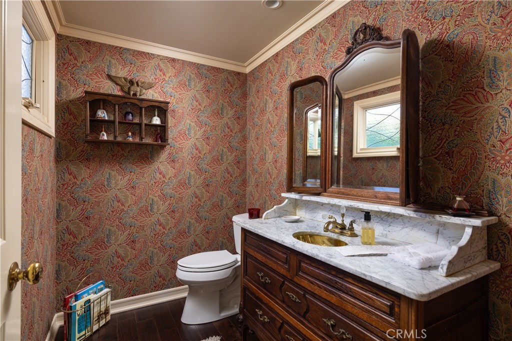 1901 Windward Lane Newport Beach, CA 92660 - Photo 21 of 52 a bathroom with a granite countertop toilet sink and mirror