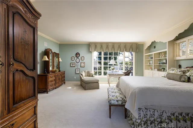 a large bathroom with a double vanity sink large mirror and bathtub