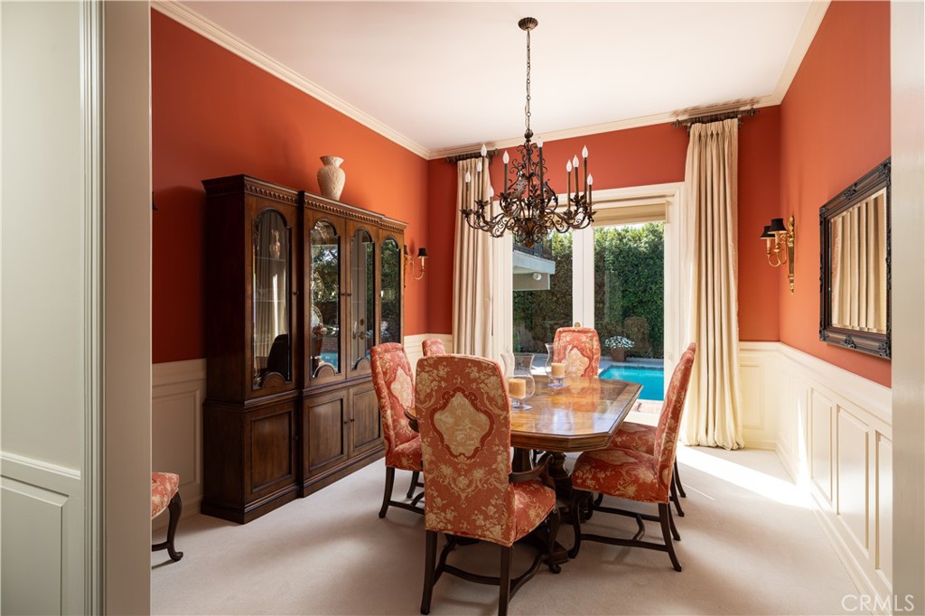 1901 Windward Lane Newport Beach, CA 92660 - Photo 28 of 52 a dining room with furniture a chandelier and window