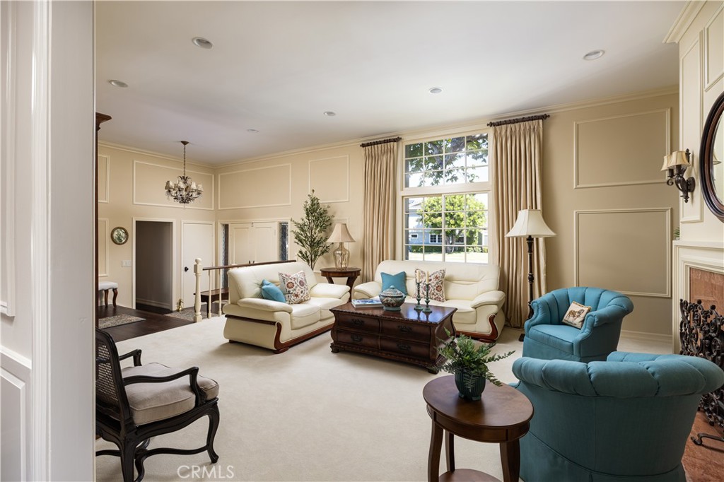 1901 Windward Lane Newport Beach, CA 92660 - Photo 29 of 52 a living room with furniture and a large window