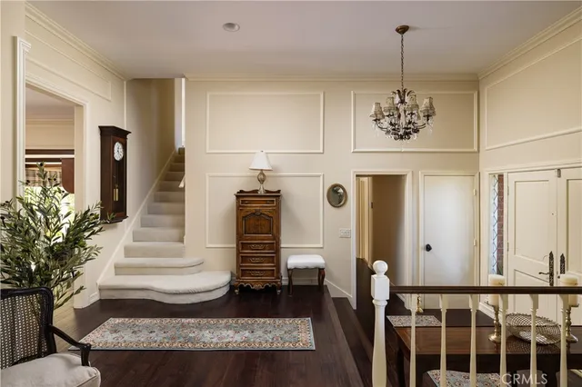 a large bathroom with a large window and a sink