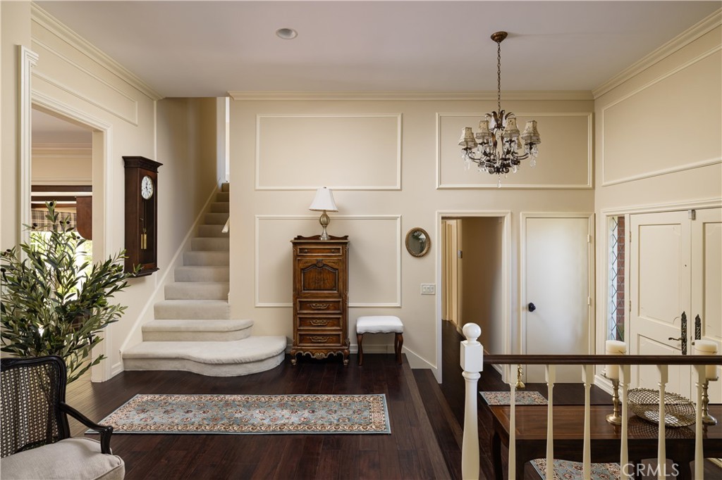 1901 Windward Lane Newport Beach, CA 92660 - Photo 32 of 52 a view of a hallway with wooden floor and stairs