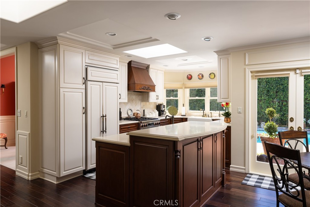 1901 Windward Lane Newport Beach, CA 92660 - Photo 33 of 52 a kitchen with stainless steel appliances granite countertop a stove and a refrigerator