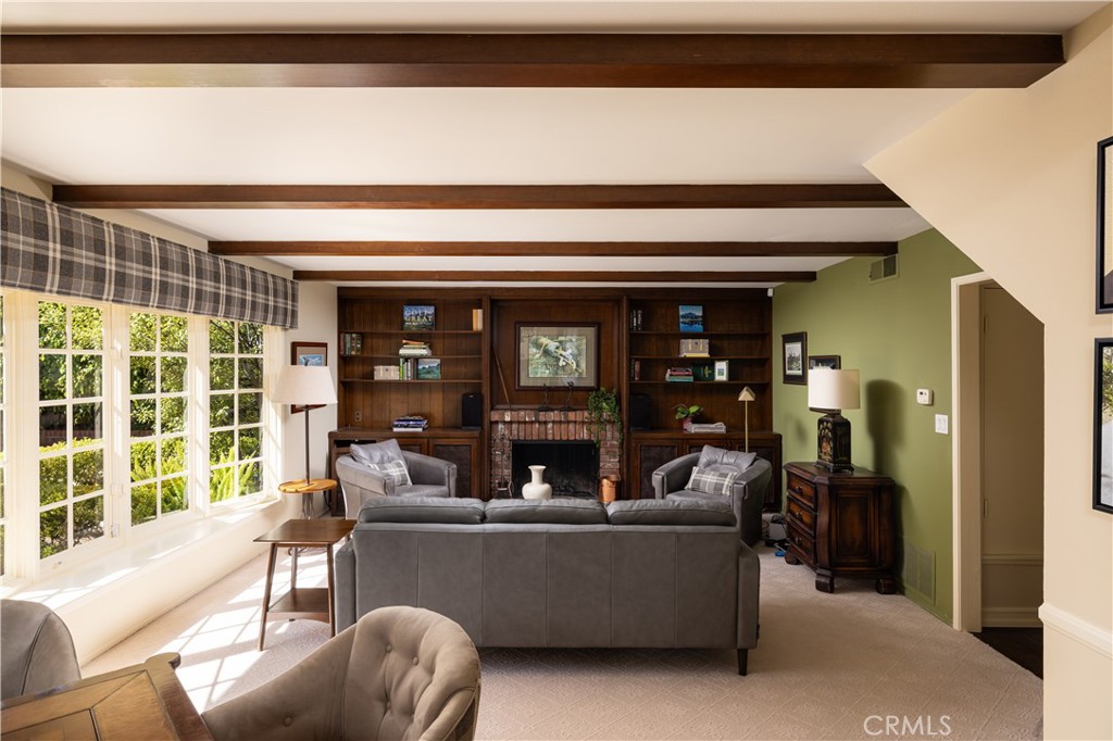 1901 Windward Lane Newport Beach, CA 92660 - Photo 37 of 52 a living room with furniture and windows