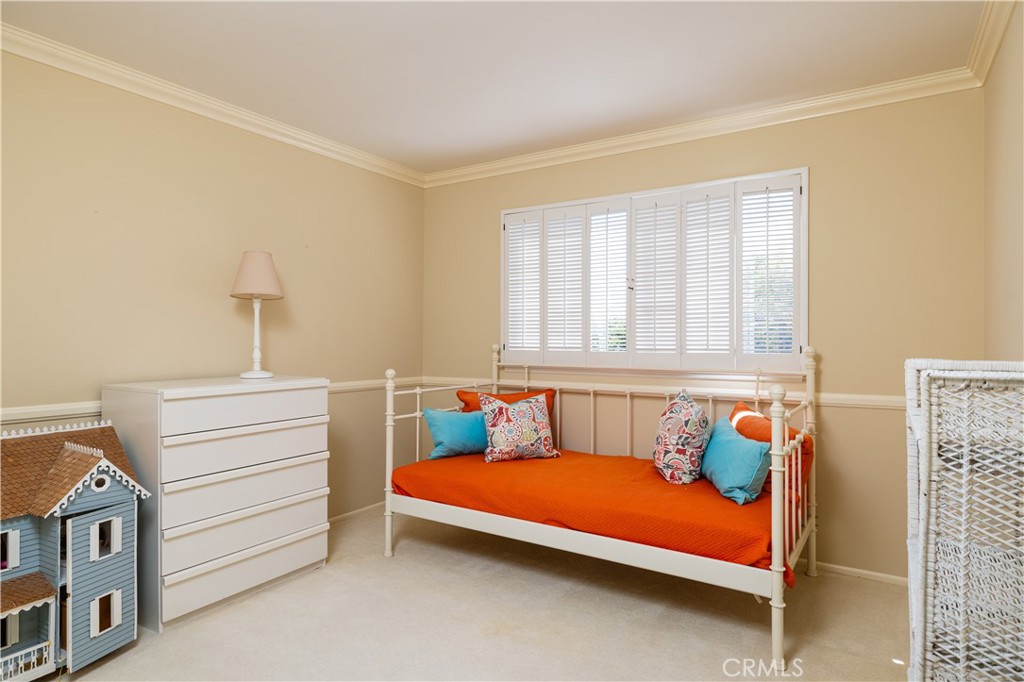 1901 Windward Lane Newport Beach, CA 92660 - Photo 40 of 52 a bedroom with a bed and a window