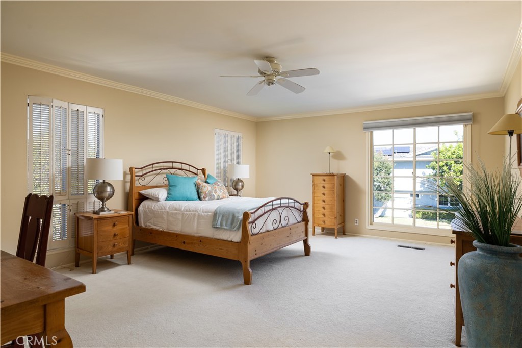 1901 Windward Lane Newport Beach, CA 92660 - Photo 43 of 52 a bedroom with a bed chair and window