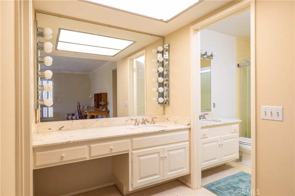 1901 Windward Lane Newport Beach, CA 92660 - Photo 44 of 52 a bathroom with a sink and a mirror