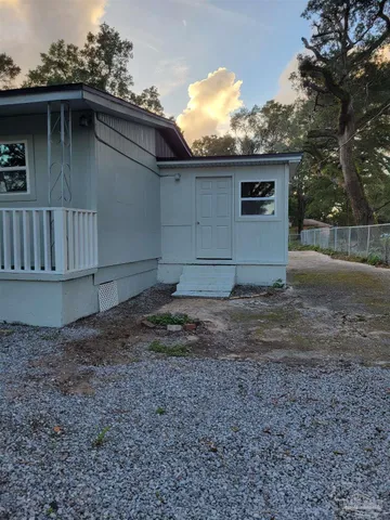 a view of backyard of house