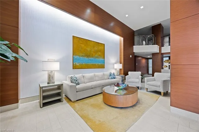 a view of a patio with couches and potted plants