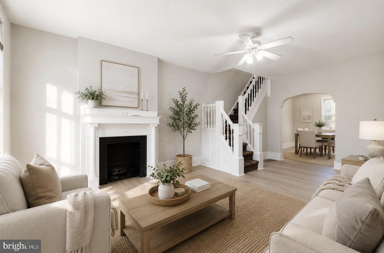 4817 Ridge Avenue Philadelphia, PA 19129 - Photo 2 of 34 a living room with furniture and a fireplace