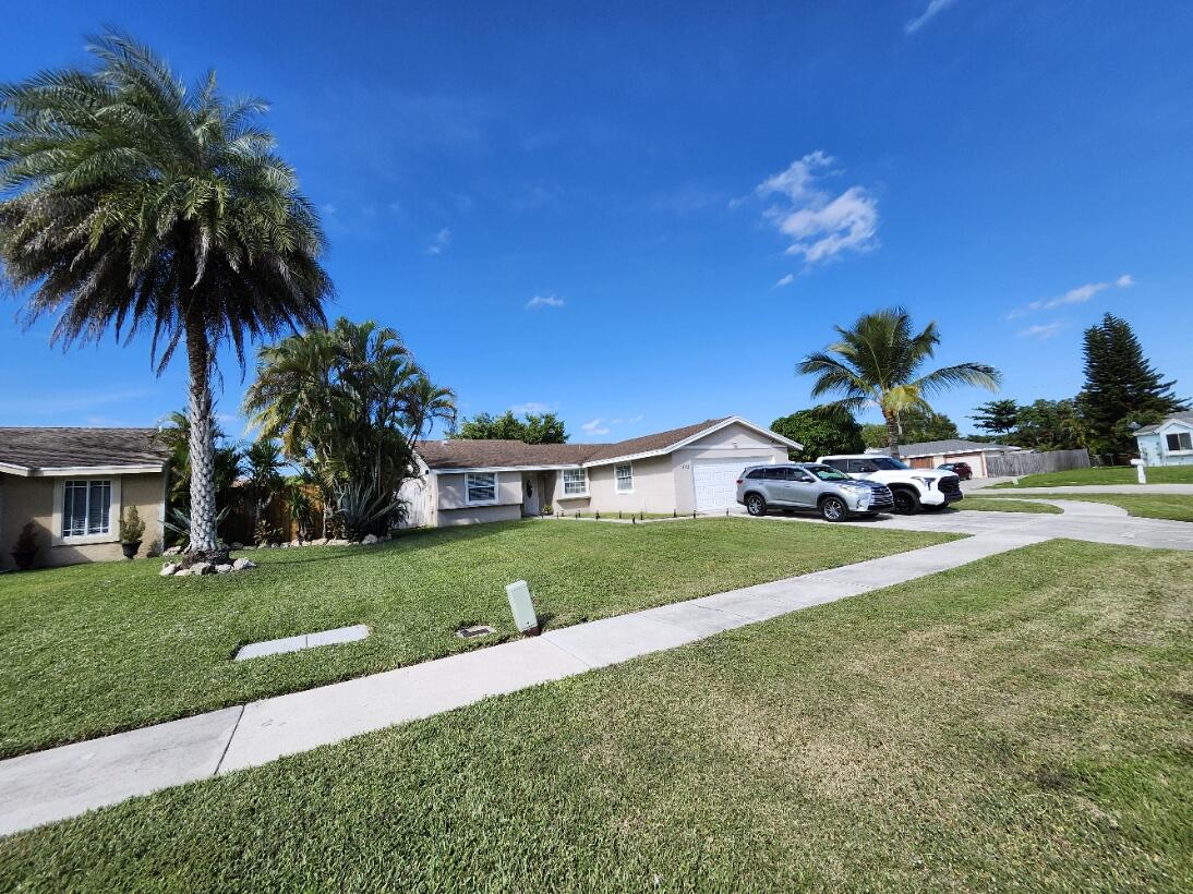 1473 Donwoods Lane Royal Palm Beach, FL 33411 - Photo 1 of 95 Corner House