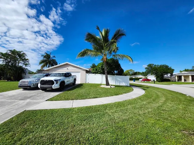 a view of outdoor space yard and swimming pool