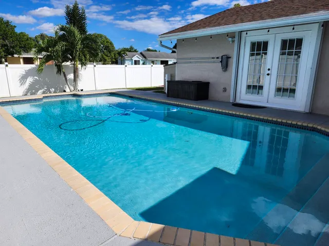 a bedroom with a bed and a view of bathroom
