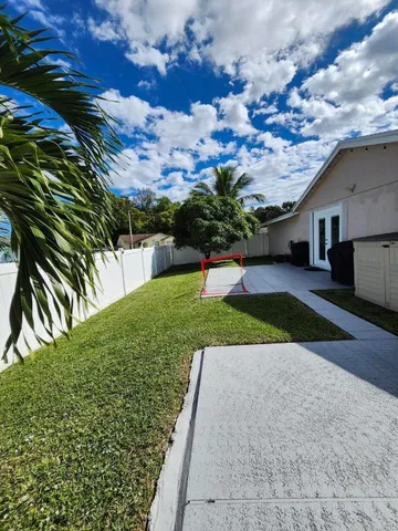 a bathroom with a sink double vanity and a mirror
