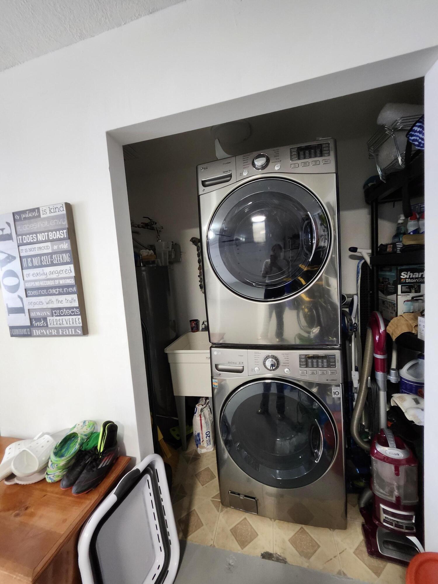 1473 Donwoods Lane Royal Palm Beach, FL 33411 - Photo 47 of 95 a utility room with dryer and washer