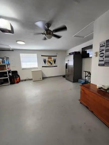 a bed room with a bed and a large mirror