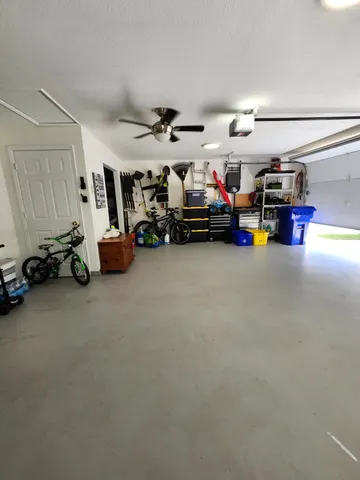 a bed room with bed and window